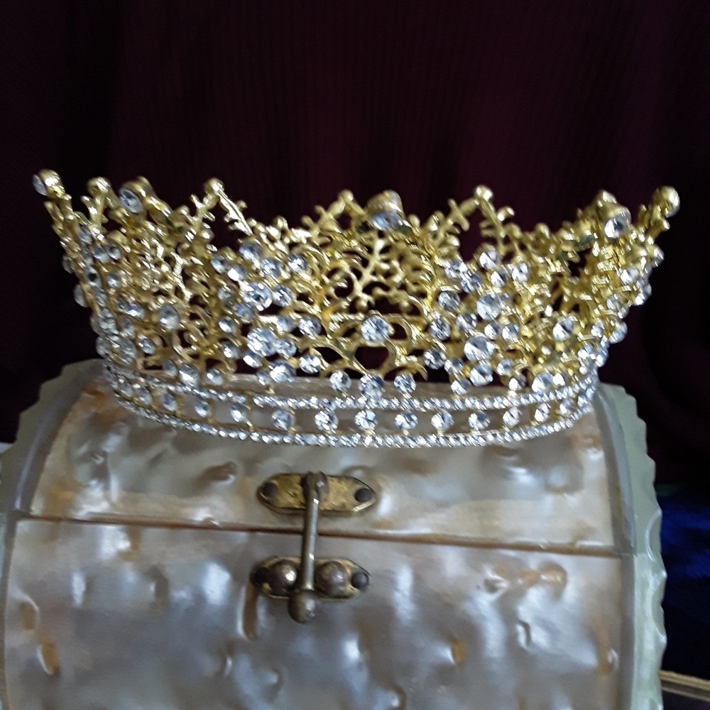 Gold and rhinstone tiara .